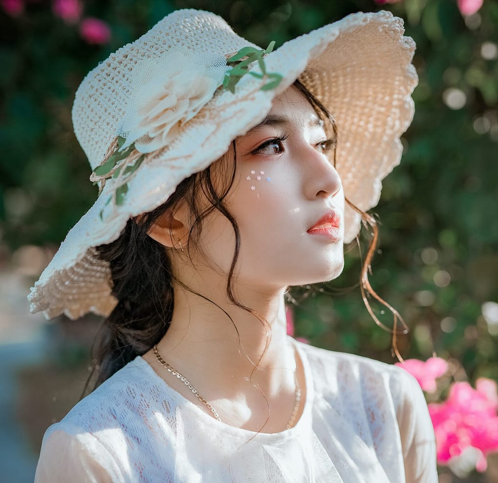 beautiful chinese woman with a hat