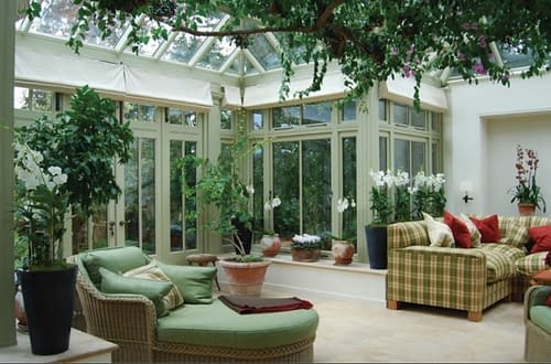 living in a greenhouse mansion