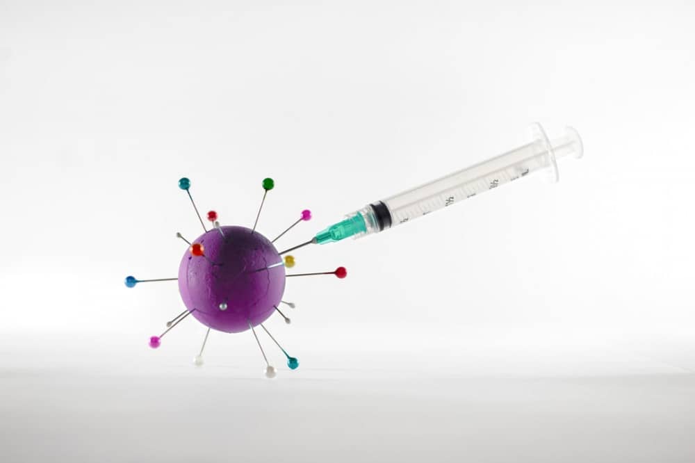 a virus and an injection needle
